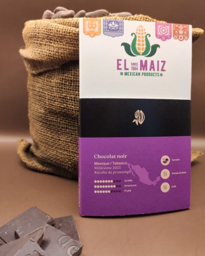Une tablette de chocolat blanche et rose sur laquel on peut lire "El Maiz, Mexian products, since 1984".