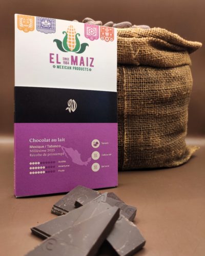 Une tablette de chocolat blanche et rose sur laquel on peut lire "El Maiz, Mexian products, since 1984".